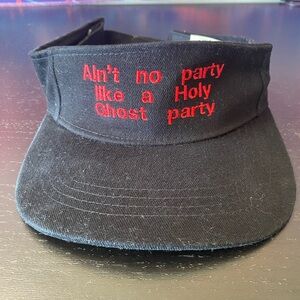 Black adjustable visor cap with red "Ain't no party like a holy ghost party"